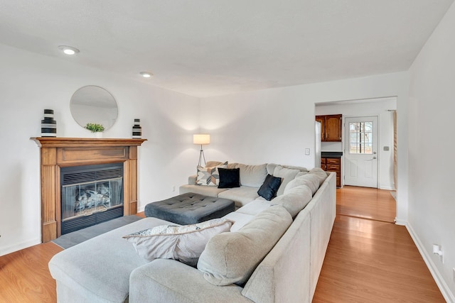 living room with light hardwood / wood-style floors