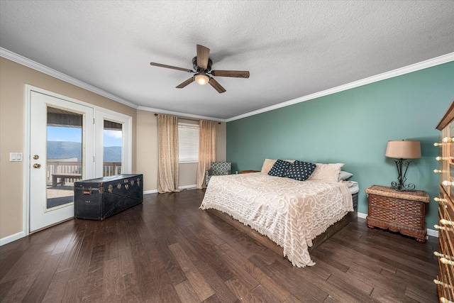 bedroom featuring a textured ceiling, dark hardwood / wood-style floors, ceiling fan, and access to exterior