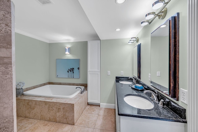 bathroom with vanity, tiled bath, ornamental molding, and tile patterned floors