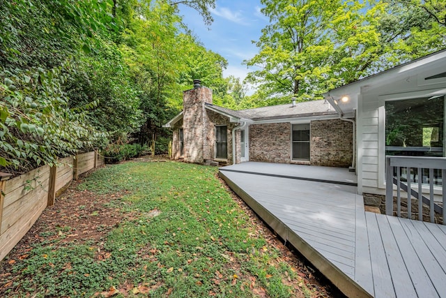 view of yard with a deck