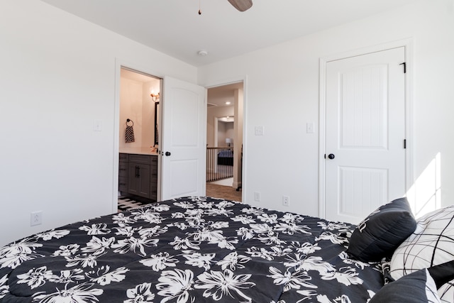 carpeted bedroom featuring connected bathroom and ceiling fan