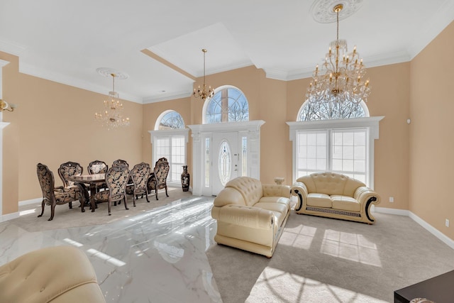 carpeted living room with crown molding and a chandelier