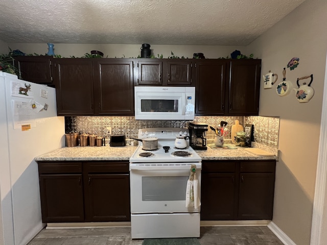 kitchen featuring white appliances, dark brown cabinetry, tasteful backsplash, and a textured ceiling