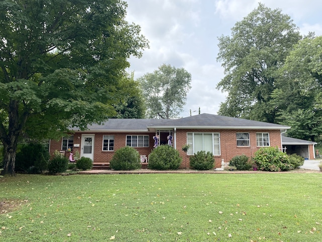 single story home with a front yard