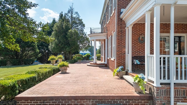 view of patio / terrace featuring a balcony