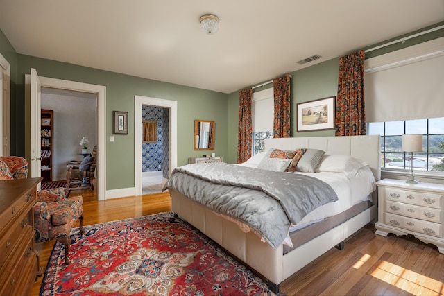 bedroom featuring hardwood / wood-style flooring