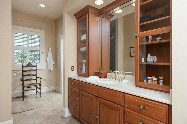 bathroom featuring vanity and tile patterned flooring