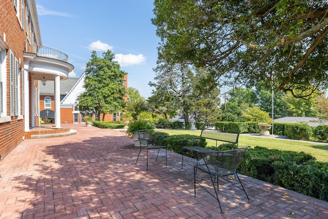 view of patio / terrace with a balcony