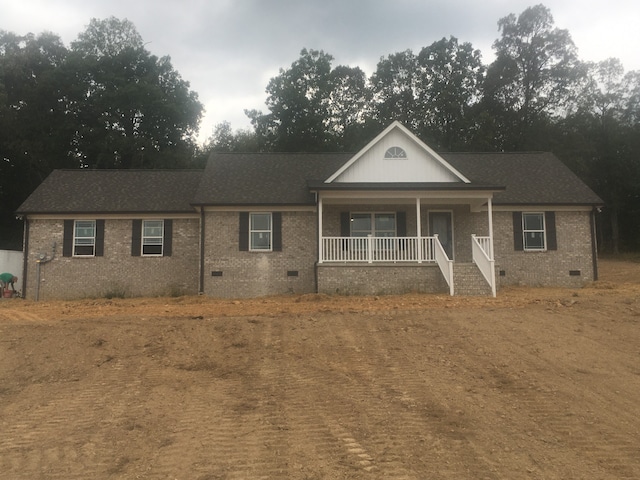 view of front of house featuring covered porch