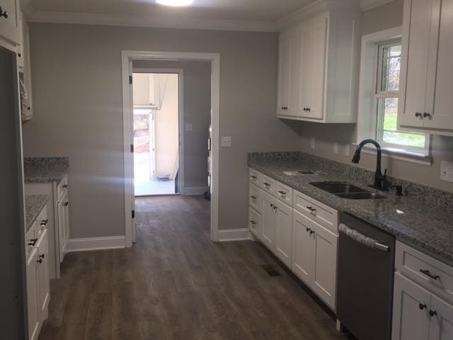 kitchen featuring white cabinetry, dishwasher, sink, light stone counters, and dark hardwood / wood-style flooring