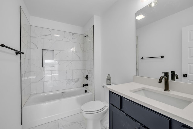 full bathroom with vanity, tiled shower / bath combo, and toilet