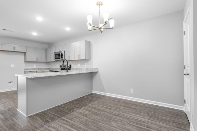 kitchen with baseboards, visible vents, recessed lighting, and appliances with stainless steel finishes