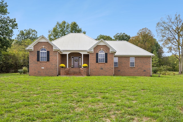 ranch-style home featuring a front yard