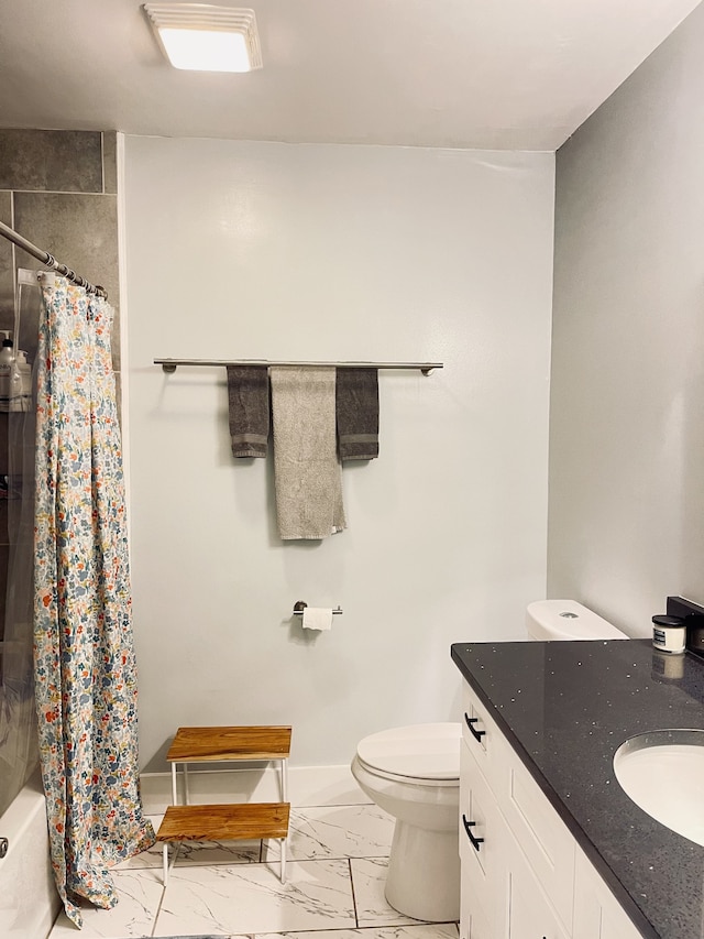 full bathroom with vanity, shower / bath combination with curtain, and toilet