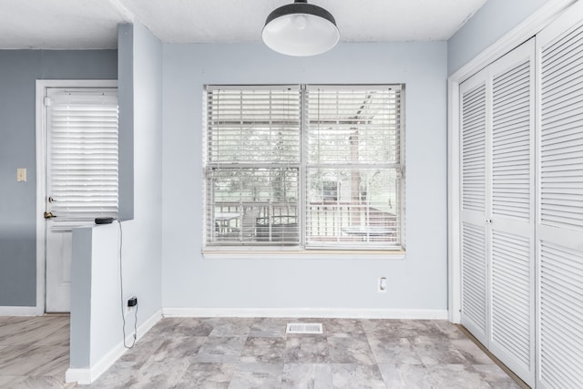 unfurnished bedroom featuring a closet