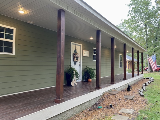 doorway to property featuring a porch