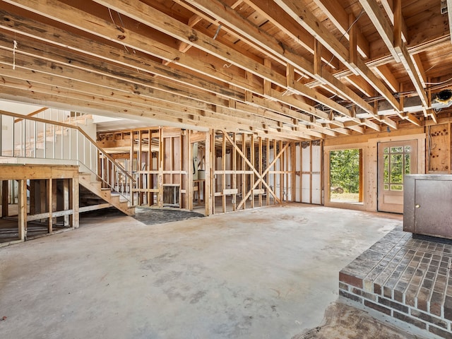 misc room with concrete flooring