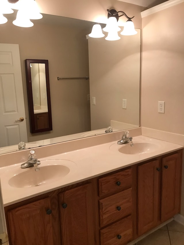 bathroom featuring tile patterned flooring and vanity