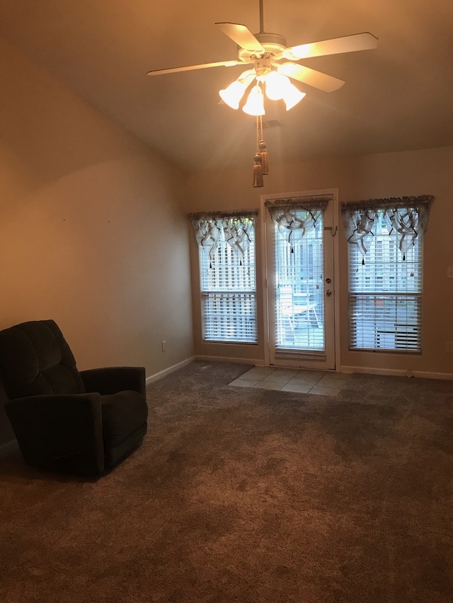 unfurnished room featuring carpet and ceiling fan