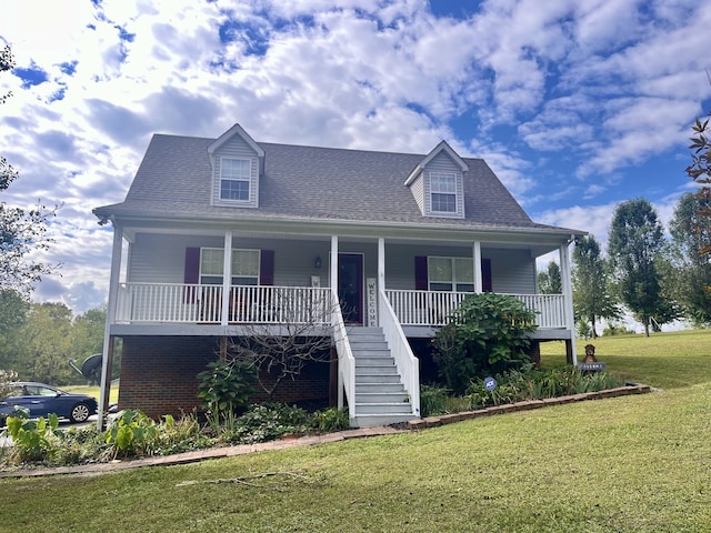 view of front of home featuring a porch and a front lawn