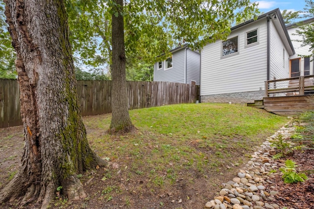 view of yard featuring a deck