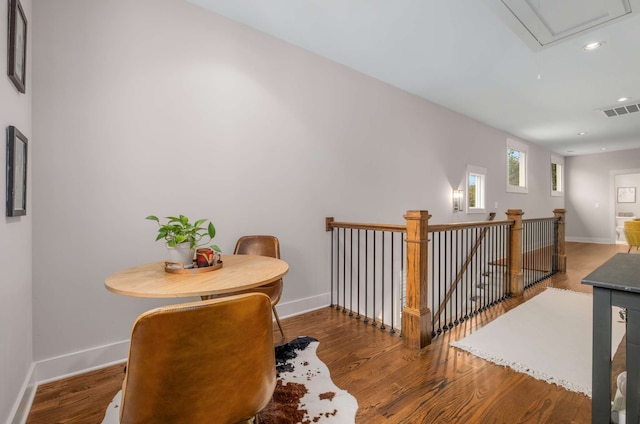 hallway with dark wood-type flooring