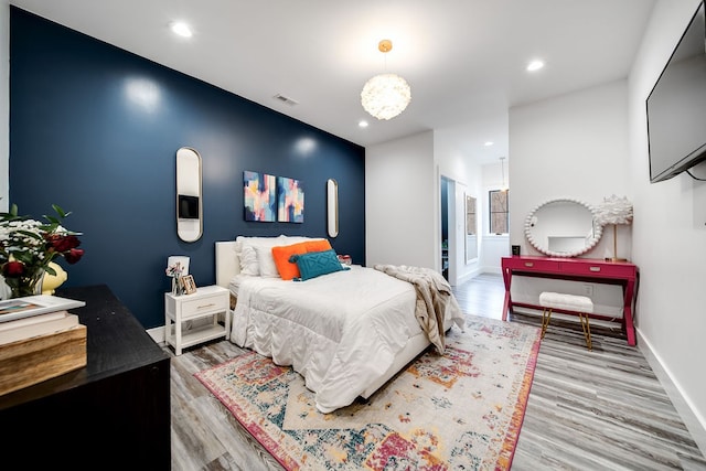 bedroom featuring light wood-type flooring