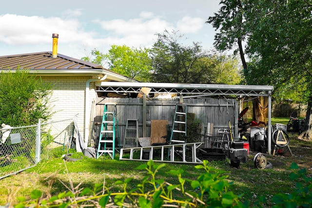 back of property with an outbuilding