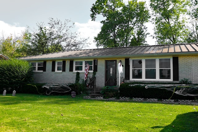 ranch-style home with a front yard