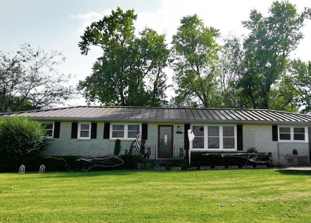 ranch-style house with a front yard