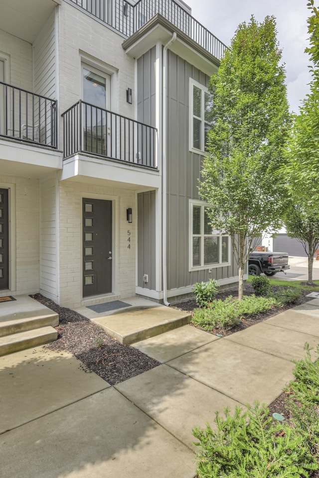 property entrance with a balcony