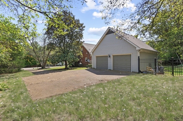 garage with a yard