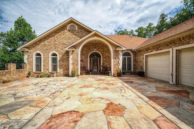 view of front of property with a garage