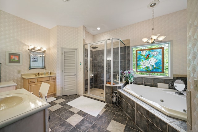 bathroom with shower with separate bathtub, tile patterned flooring, and vanity