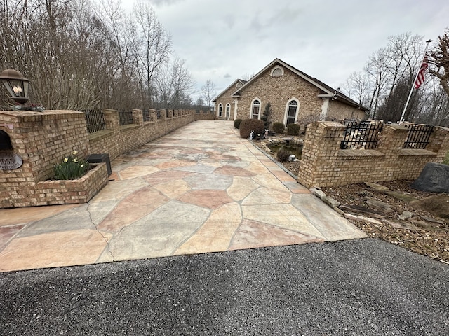 view of property exterior featuring a patio