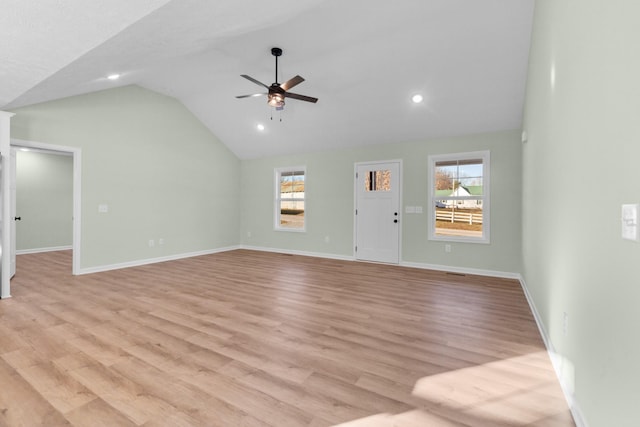 unfurnished living room featuring recessed lighting, vaulted ceiling, ceiling fan, light wood-type flooring, and baseboards