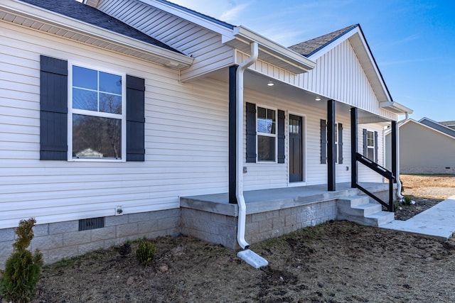 exterior space with crawl space, a porch, and roof with shingles