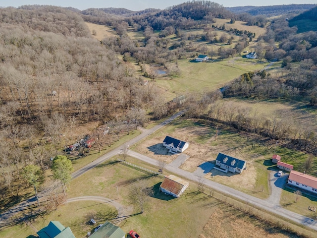 birds eye view of property featuring a rural view