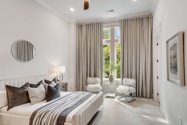 bedroom featuring ceiling fan and light colored carpet