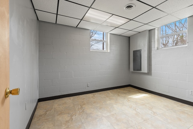 basement with a drop ceiling