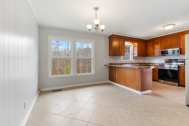 kitchen featuring kitchen peninsula, light tile patterned floors, stainless steel appliances, an inviting chandelier, and decorative light fixtures