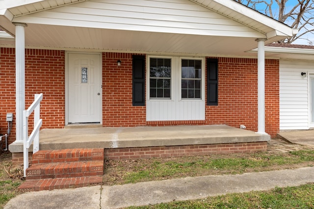 property entrance featuring covered porch