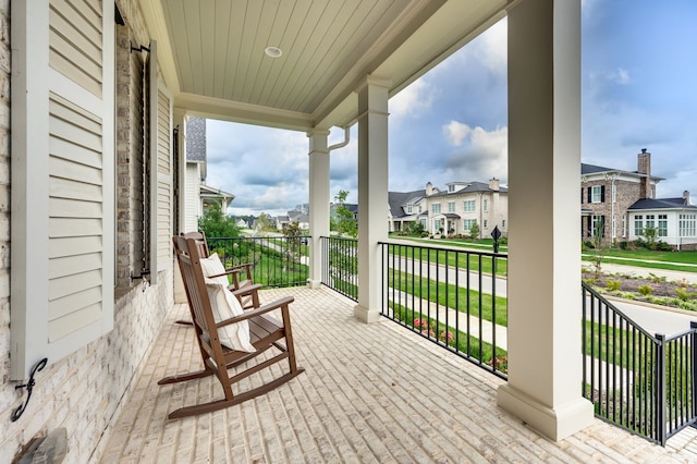 balcony featuring a porch