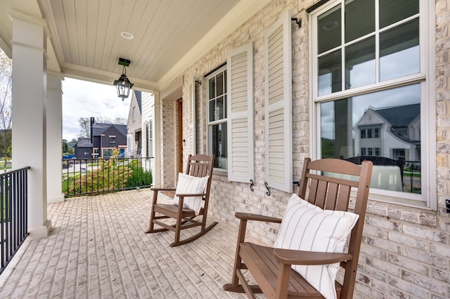 view of patio featuring a porch