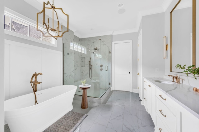 bathroom featuring crown molding, shower with separate bathtub, vanity, and a chandelier