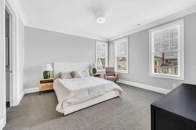 bedroom featuring carpet flooring and ornamental molding