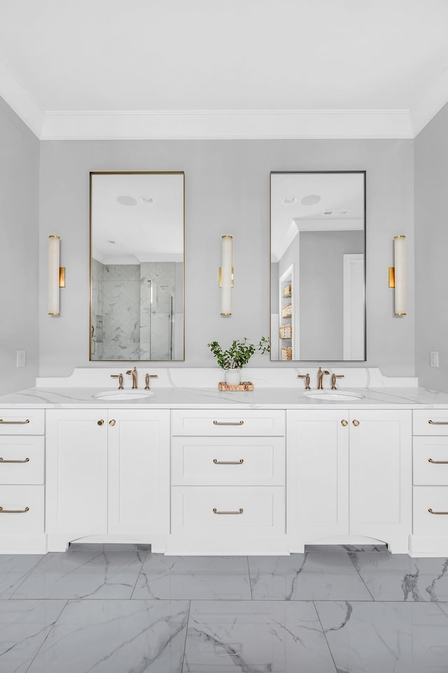 bathroom featuring an enclosed shower, vanity, and crown molding