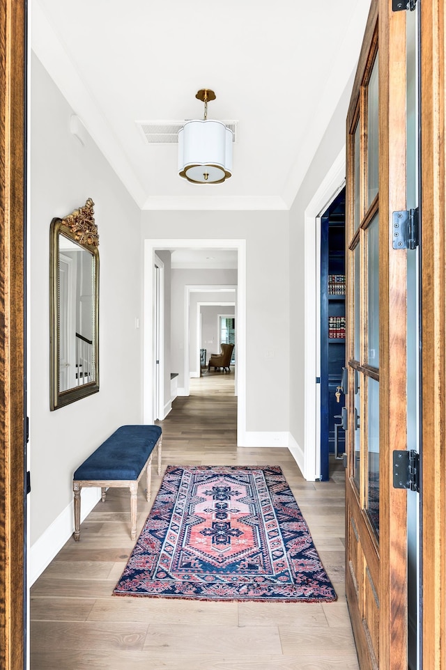 hall featuring french doors and hardwood / wood-style floors