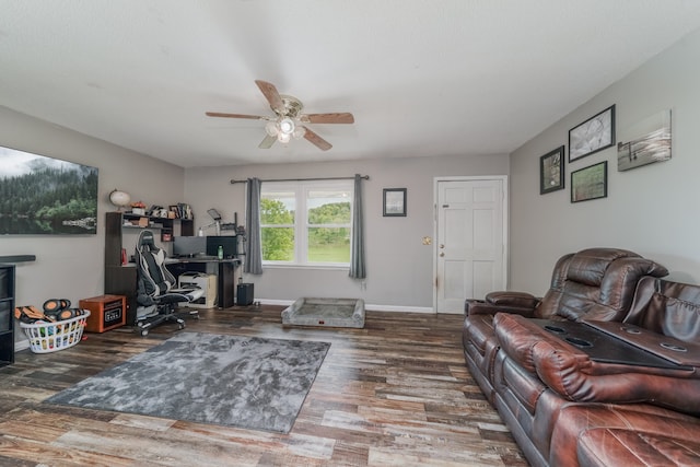 office area with ceiling fan and dark hardwood / wood-style flooring