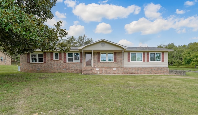 ranch-style house featuring a front lawn